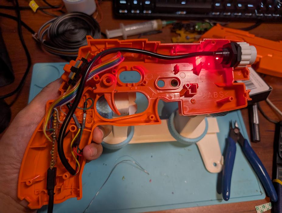 GunCon 2 chassis with IR camera installed in the muzzle and a Raspberry Pi Pico in the handle.