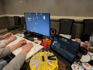 Gun Fight, an arcade game from 1975. The roulette contains two black cards among the standard numbered cards.